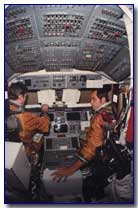 Young and Crippen in cockpit